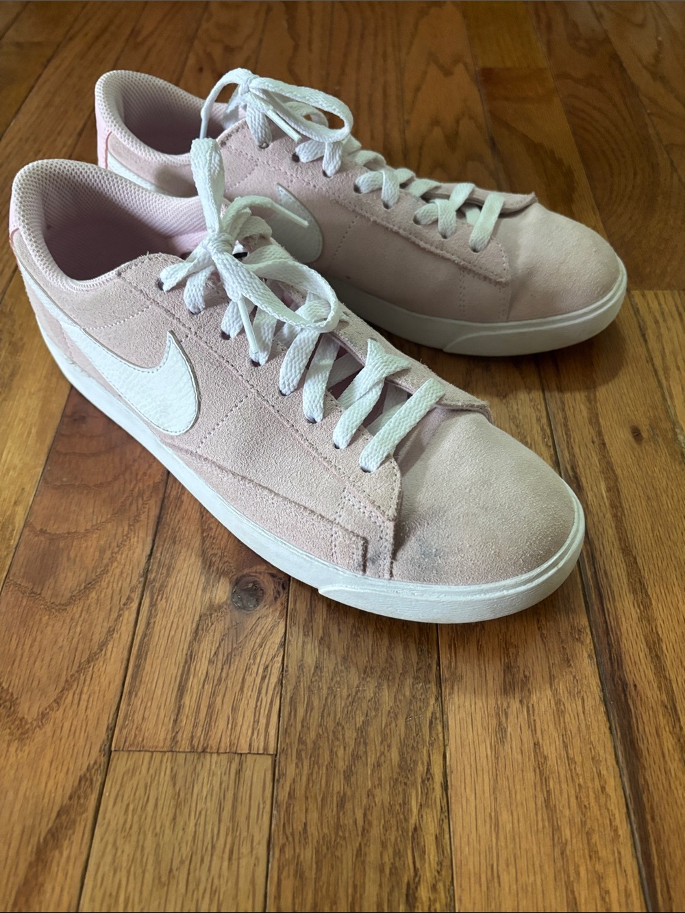 Nike Women’s Light Pink Suede Low-Top Sneakers with White Swoosh